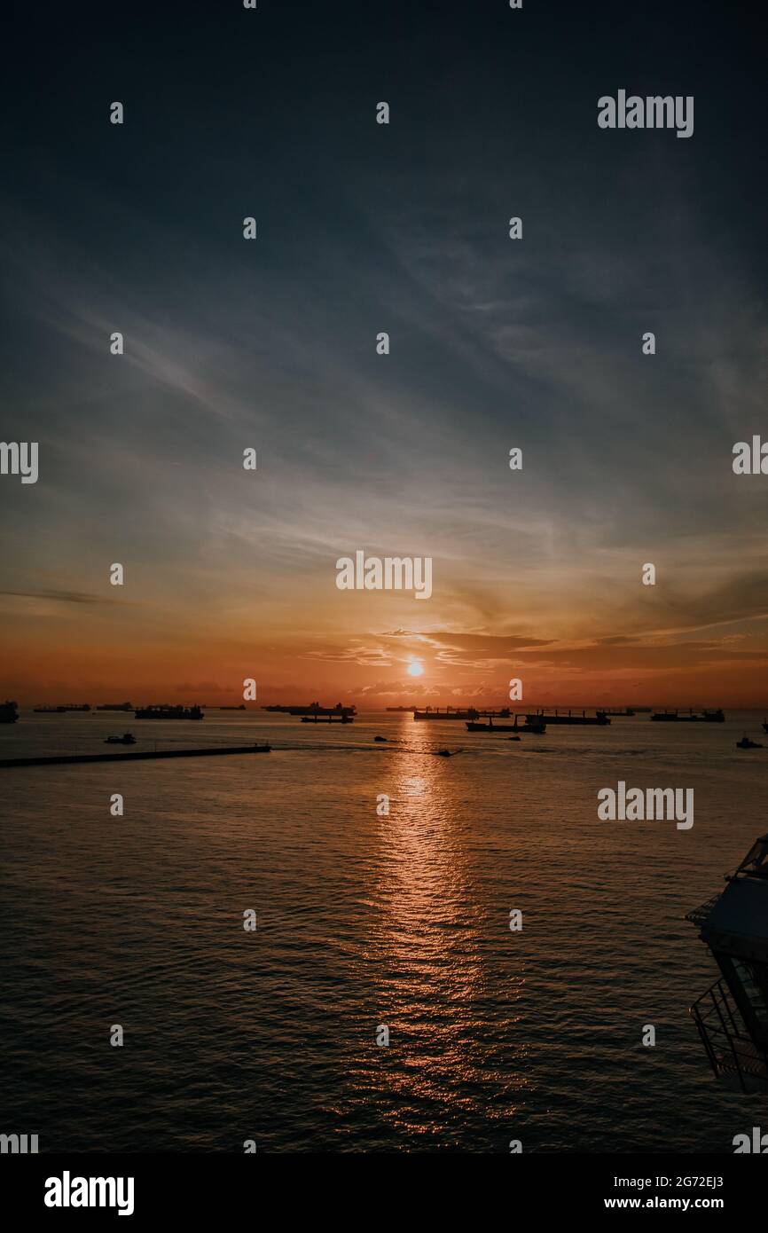 Sunset at sea clouds sky Stock Photo - Alamy