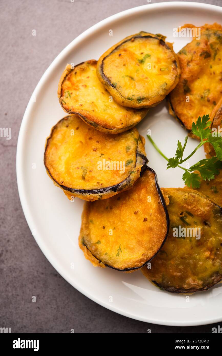 Tasty Brinjal Pakora or crispy eggplant fritters, Indian tea time snack
