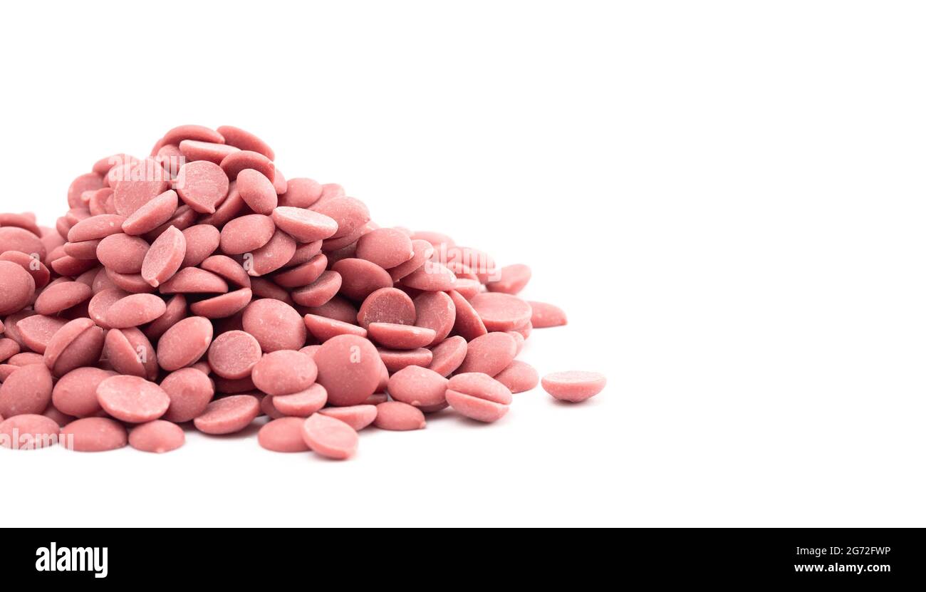 Authentic Ruby Chocolate Drops Isolated on a White Background Stock Photo