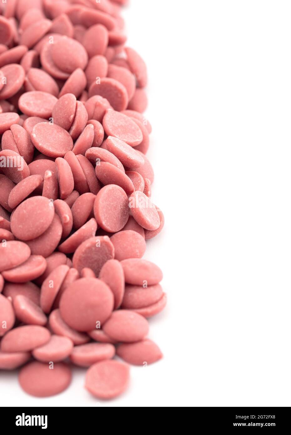 Authentic Ruby Chocolate Drops Isolated on a White Background Stock Photo