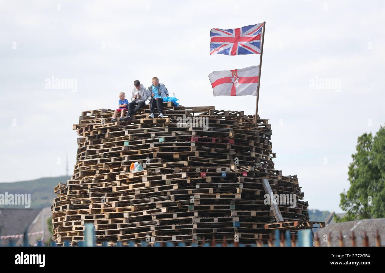 FACES PIXEATED BY PA PICTURE DESK Children on top of a bonfire near