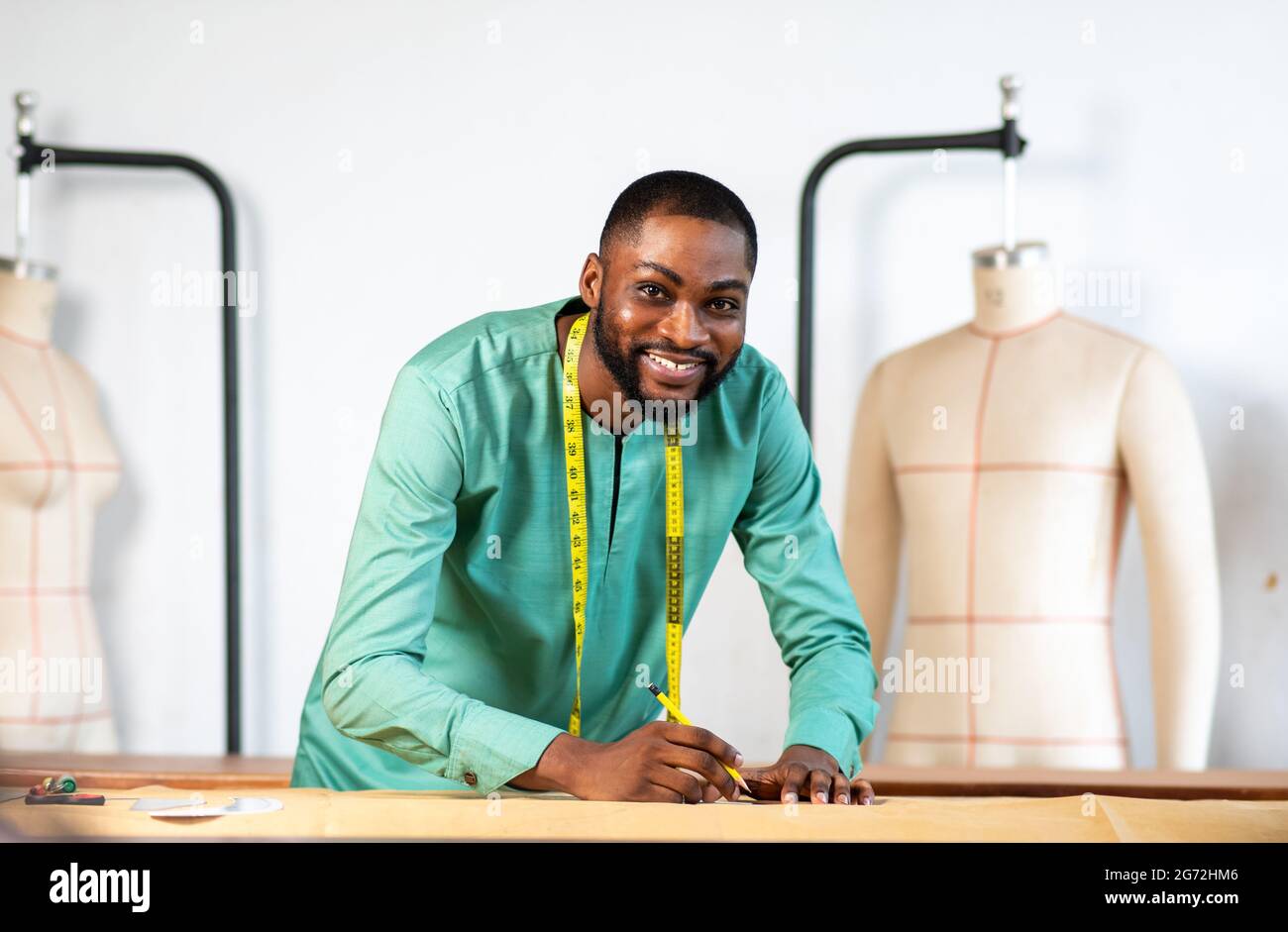 Black african man tailor working hi-res stock photography and images ...