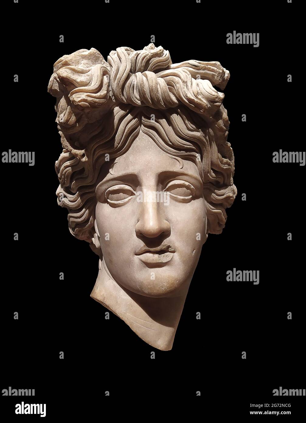 Marble Head of the Roman god Apollo, found at Rome, Italy. 2nd century. Stock Photo