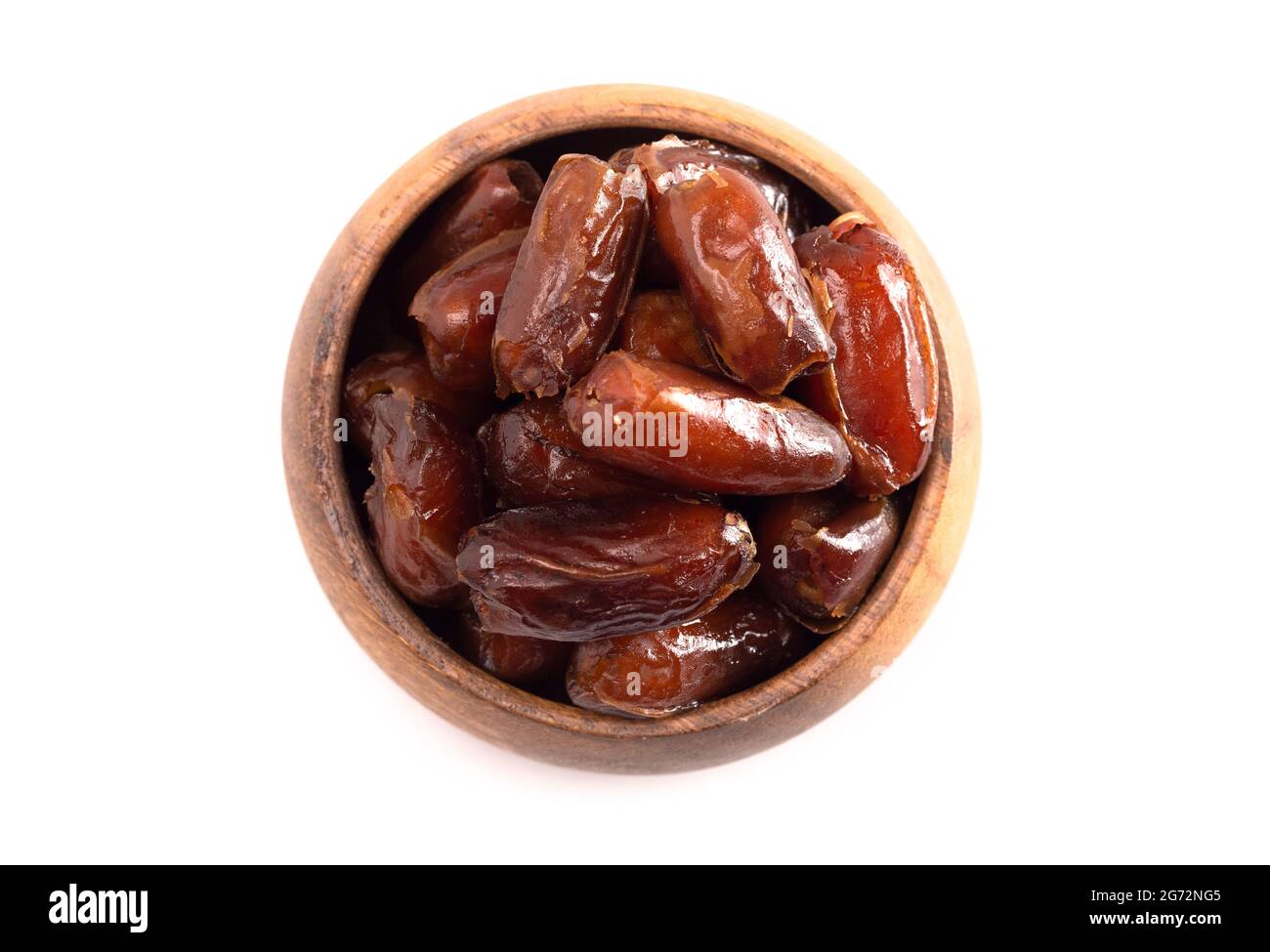 A Bowl of Pitted Dates Isolated on a White Background Stock Photo