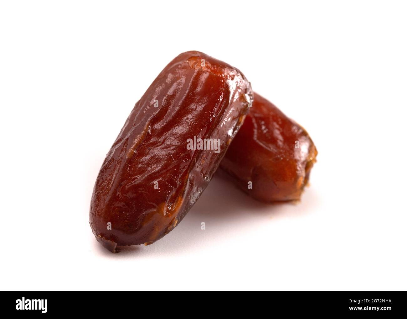 Pitted Dates Isolated on a White Background Stock Photo