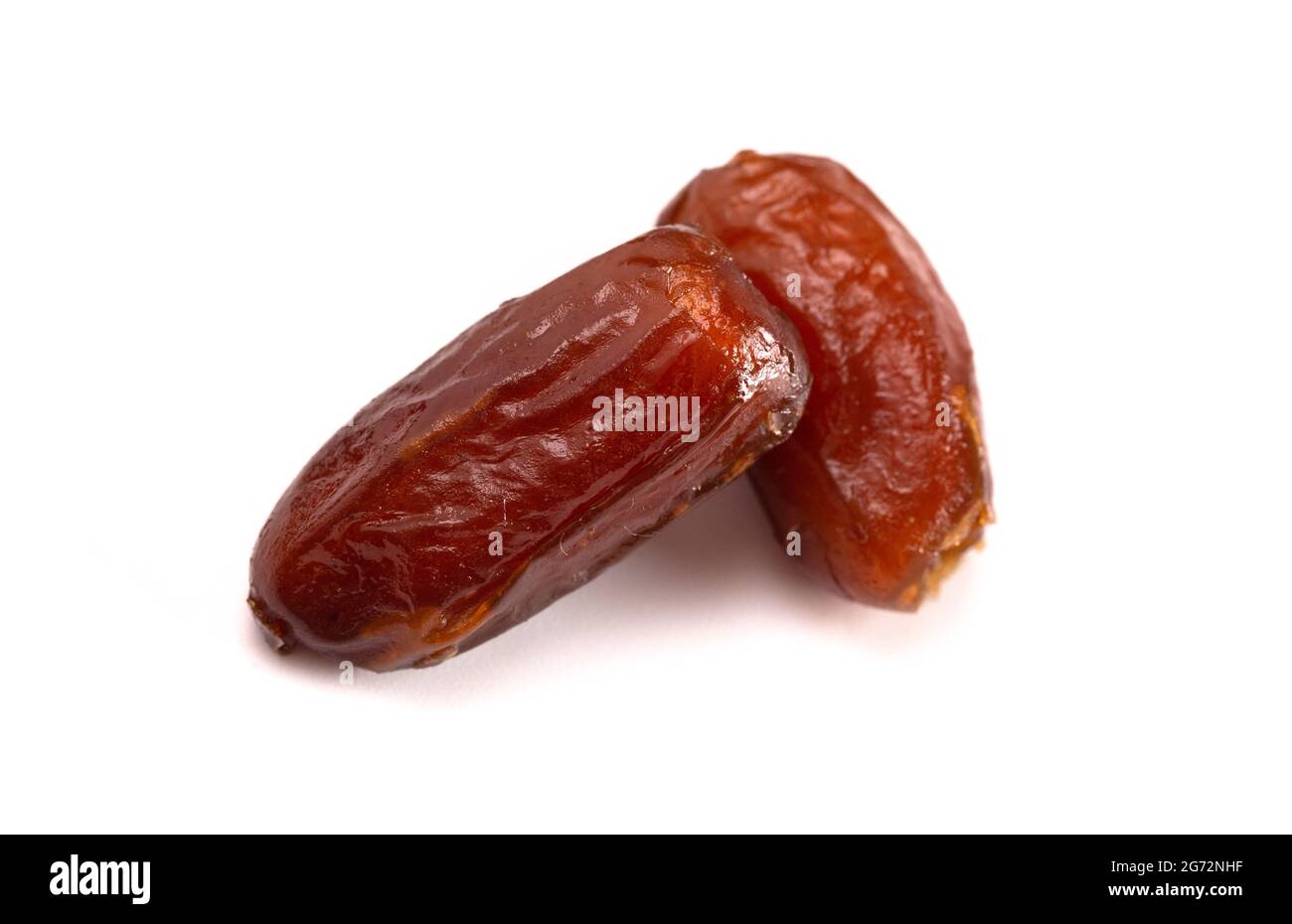 Pitted Dates Isolated on a White Background Stock Photo