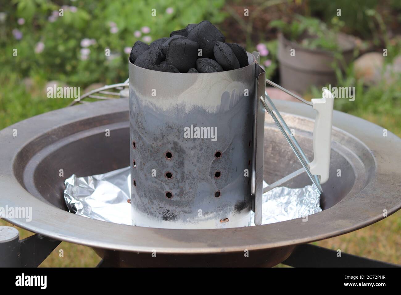 Close up of a fire chimney with combustible charcoal, ready for a