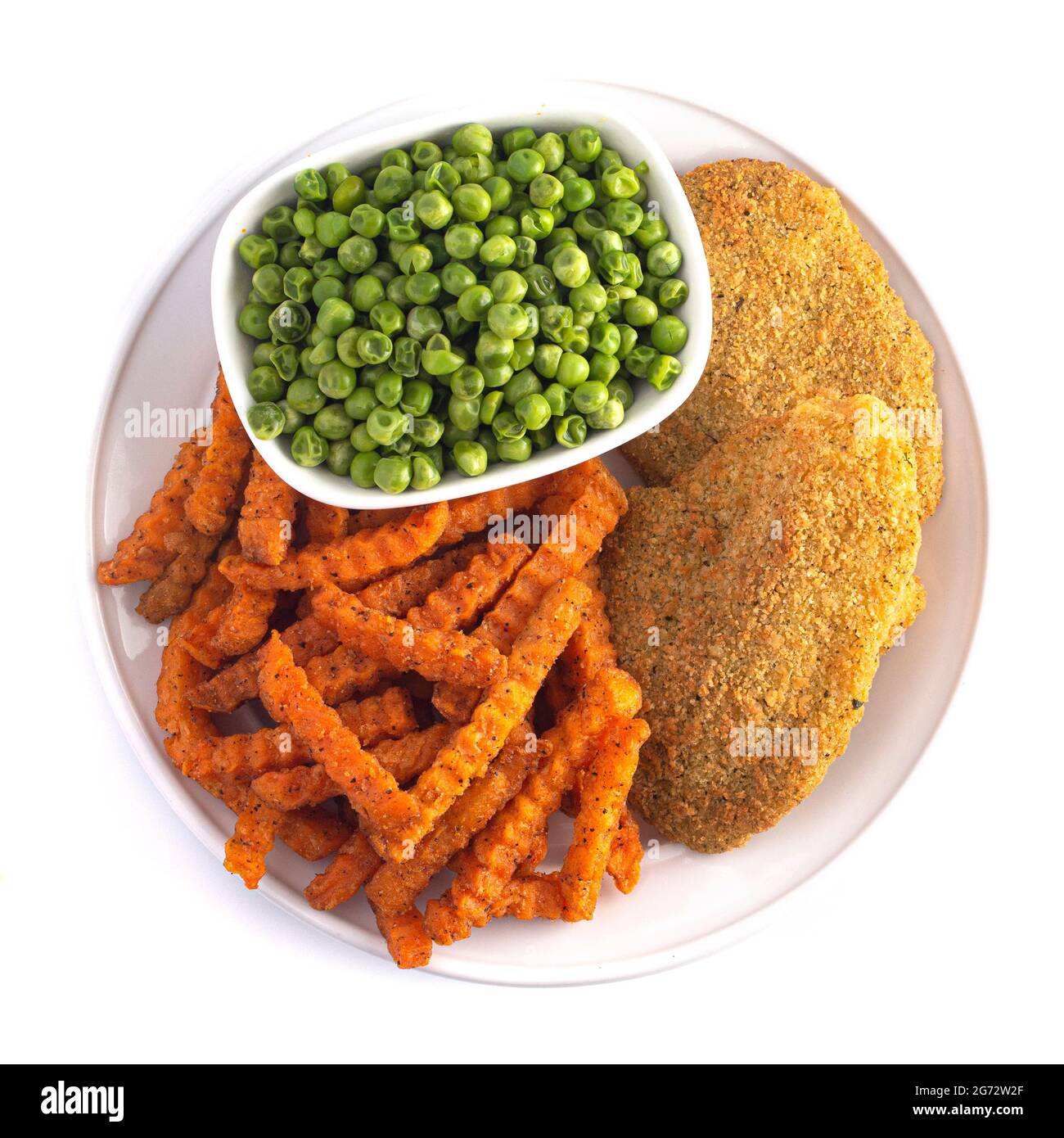 A Meal of Breaded Fish Sweet Potato Fries and Peas Stock Photo Alamy