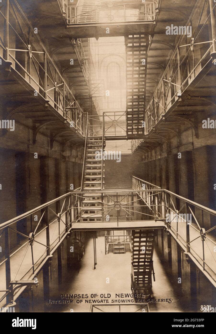 Glimpses of Old Newgate - Interior of Newgate showing the Galleries, c1900. Newgate Prison, dating back to the 12th century, was originally located at the site of Newgate, a gate in the Roman wall around the city of London. Public hangings, of both men and women, took place outside the prison from 1783 and continued until 1868, when executions were carried out on gallows inside Newgate. In total, 1,169 people were executed - publicly or otherwise - at the prison. Many types of criminals were imprisoned at Newgate, and their offences varied from petty crime and theft, breaking and entering, hig Stock Photo