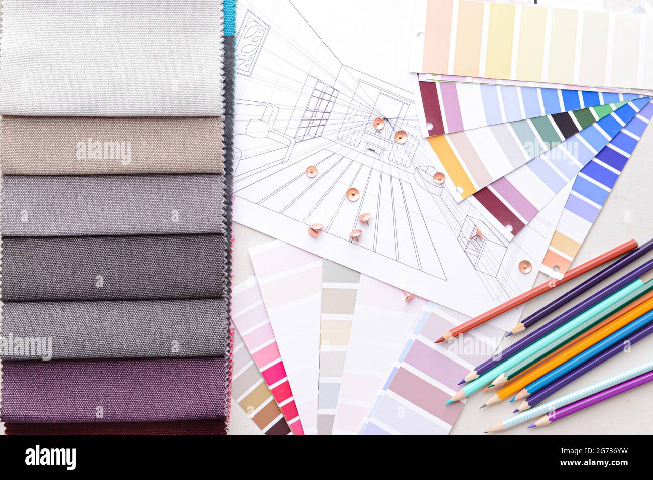 Composition with paint color palettes and fabric samples on white ...