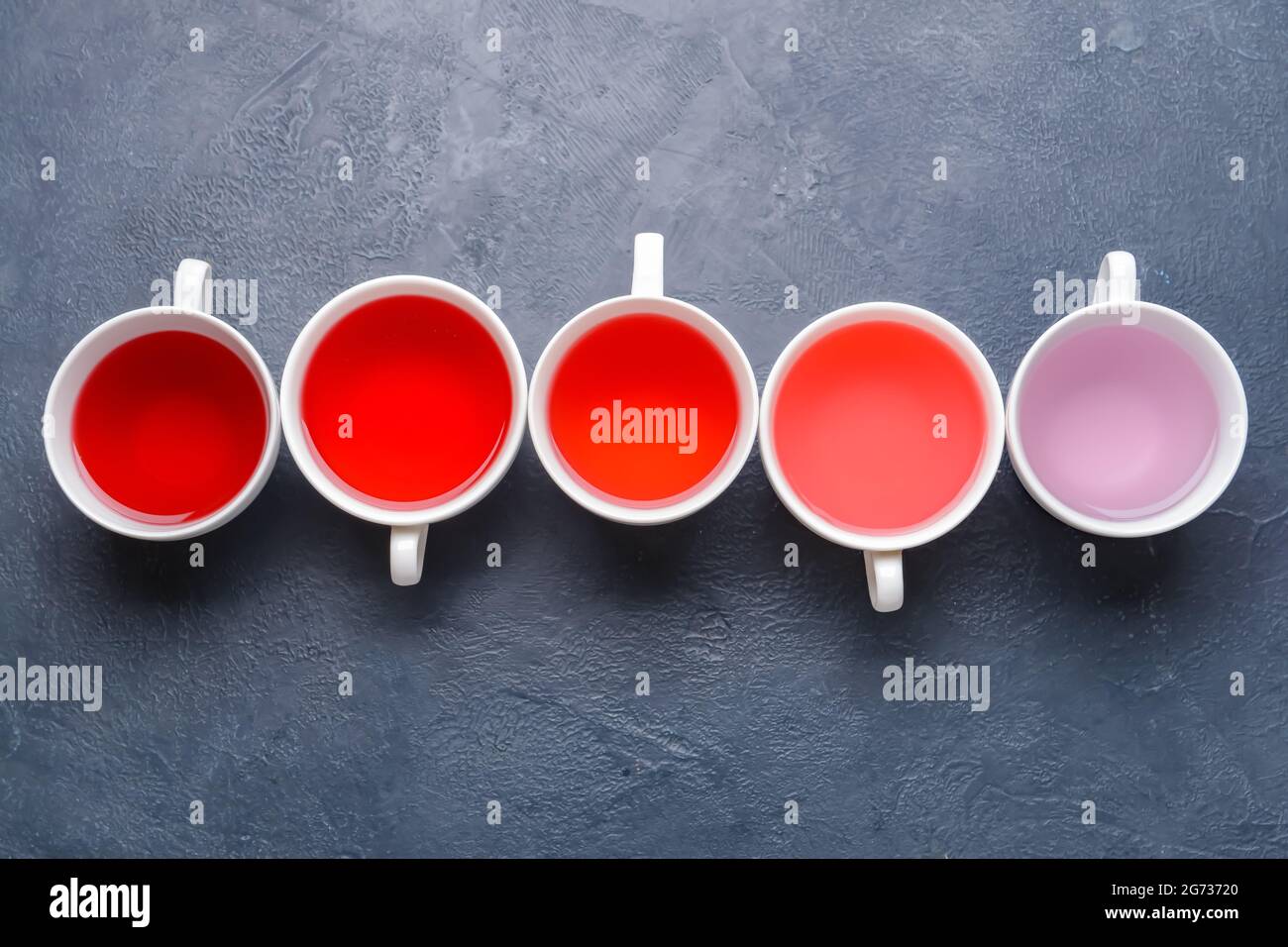 Cups with different types of hot tea on dark background Stock Photo Alamy