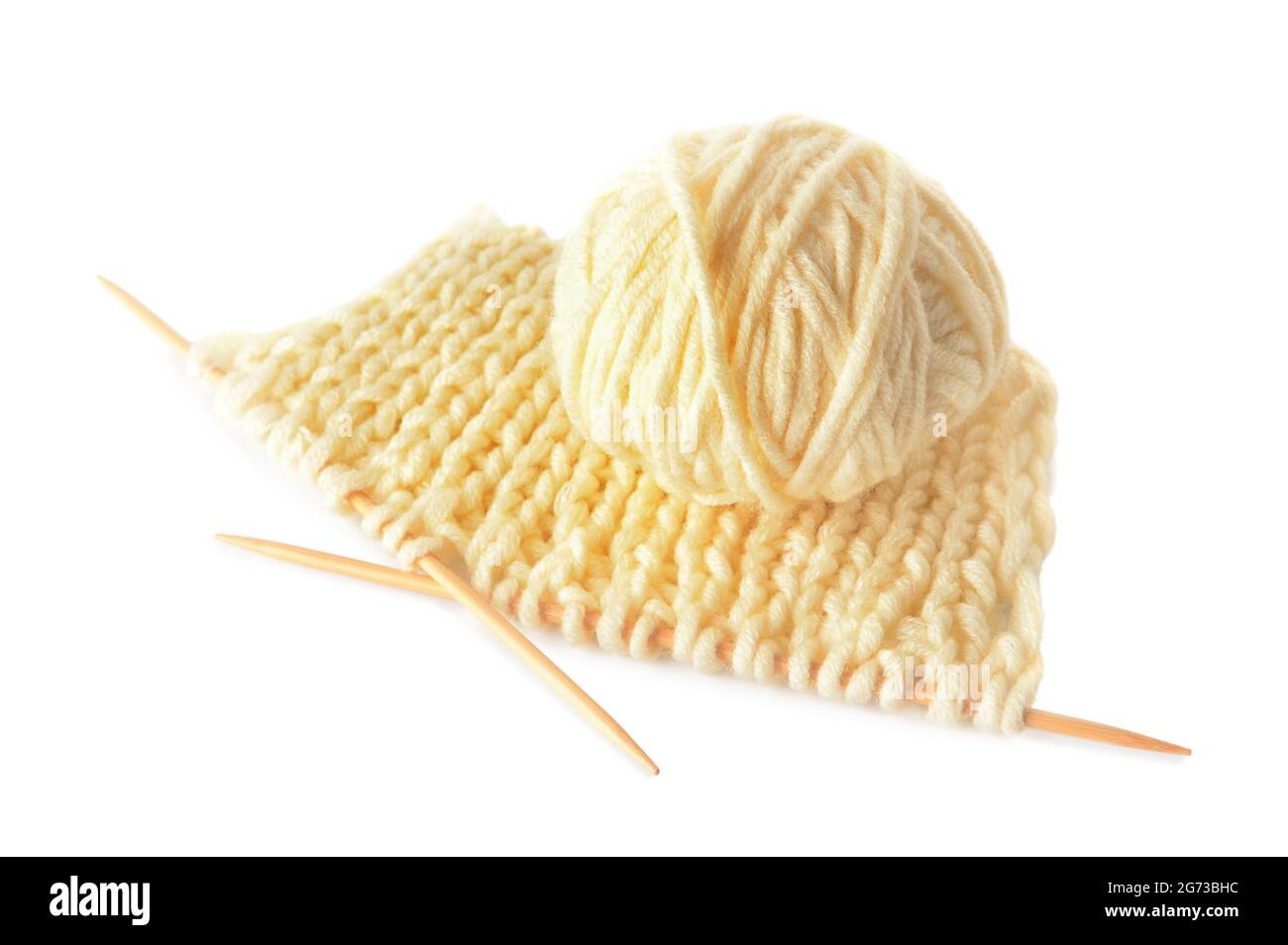 Knitting yarn and needles on white background Stock Photo - Alamy