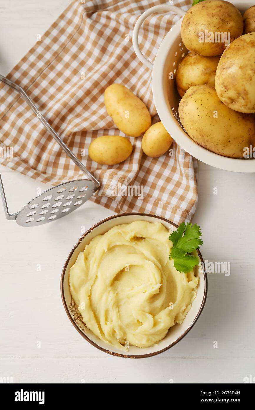 Composition with tasty mashed potatoes on light wooden background Stock  Photo - Alamy
