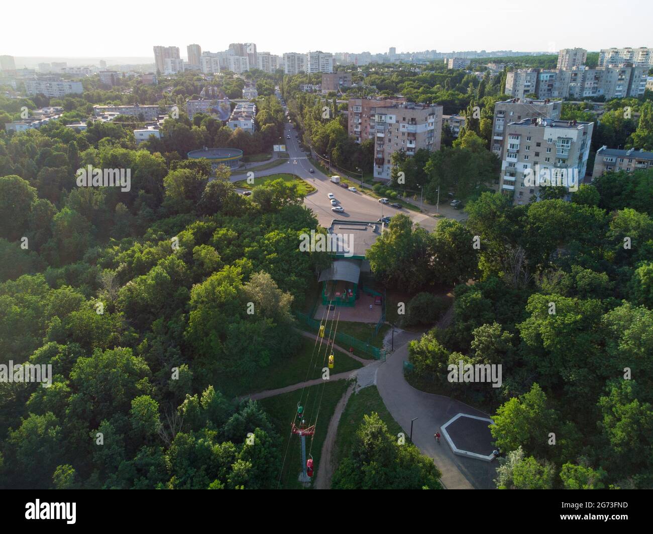 Cable car attraction station aerial view in green summer Kharkiv city popular recreation Central Park, Sarzhyn Yar Stock Photo