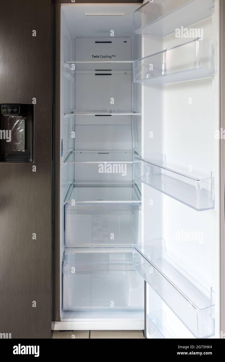 Empty american fridge freezer shelves Stock Photo - Alamy