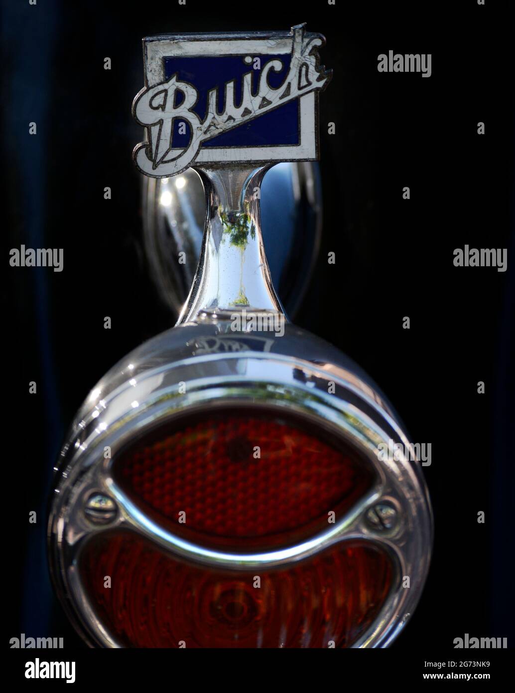 The rear tail light on a 1932 Buick on display at a Fourth of July classic car show in Santa Fe, New Mexico. Stock Photo