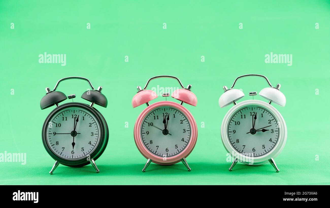 Beautiful three Alarm Clock on green screen Background Alarm Clock Face