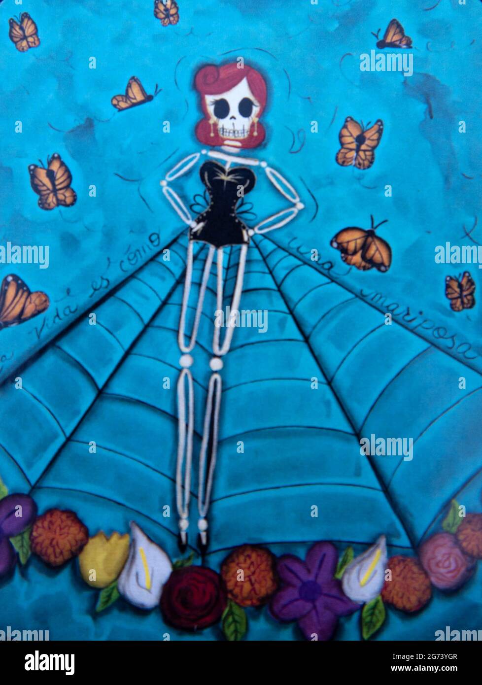 Day of the Dead image; photographic illustration; a spider woman skeleton spinning a web. Stock Photo
