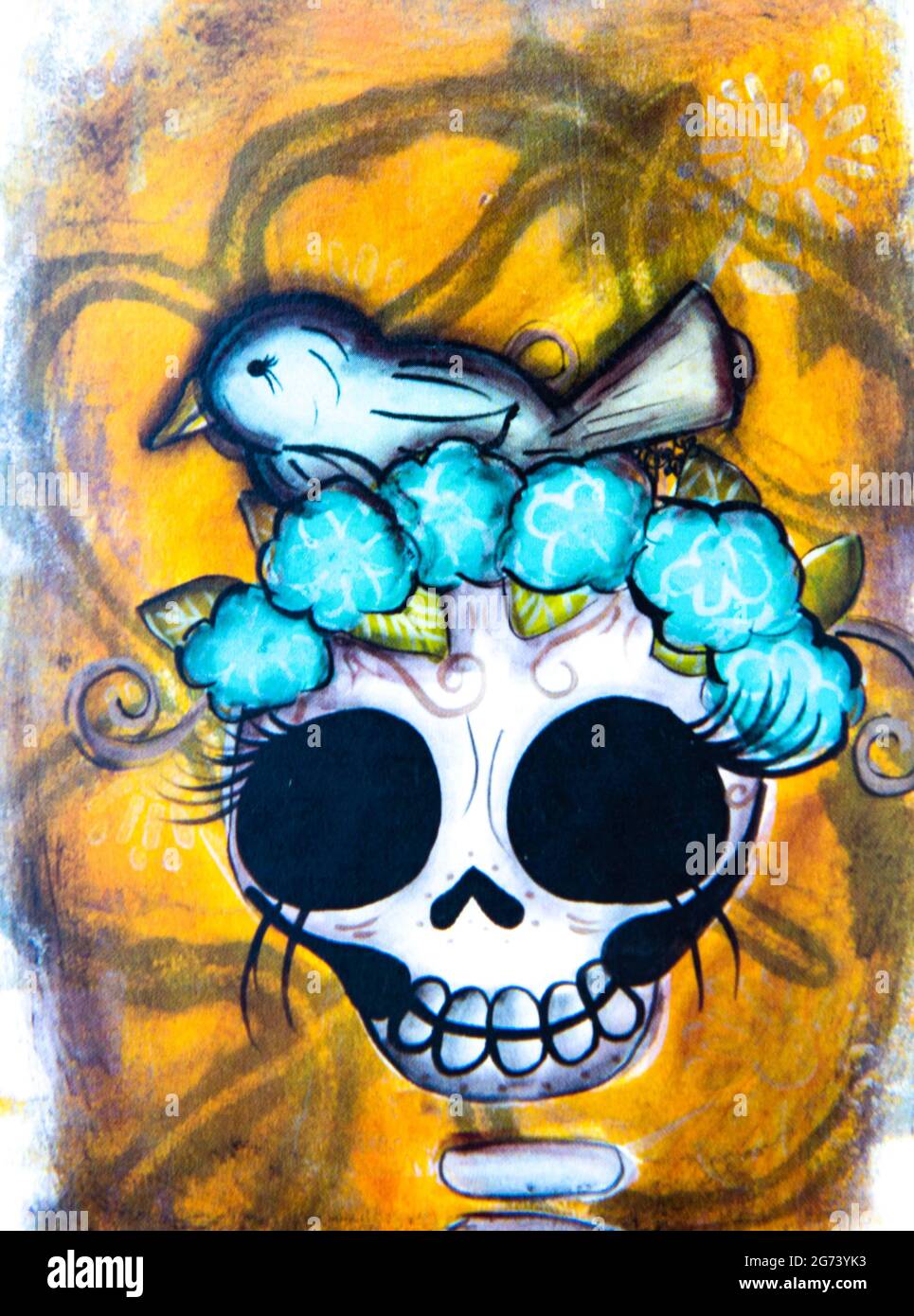 Day of the Dead image; photographic illustration; a skull with a bird on the top of it. Stock Photo