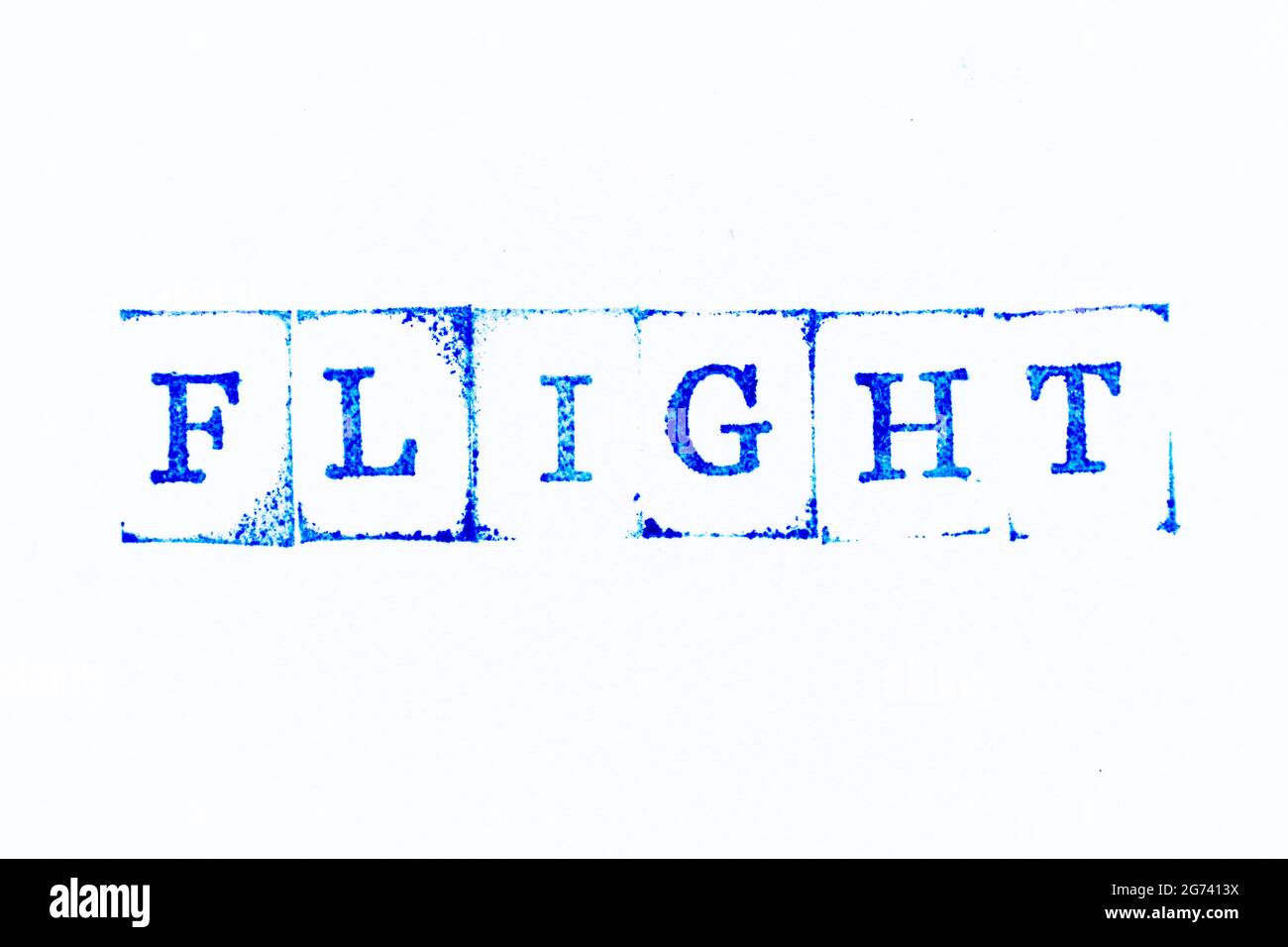 Blue color ink rubber stamp in word flight on white paper background Stock Photo