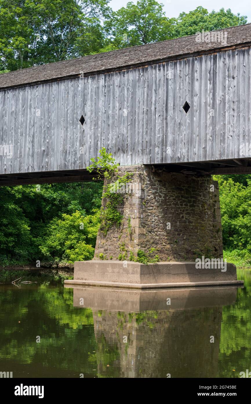 A vertical shot of the Schofield Ford Covered Bridge in Tyler State