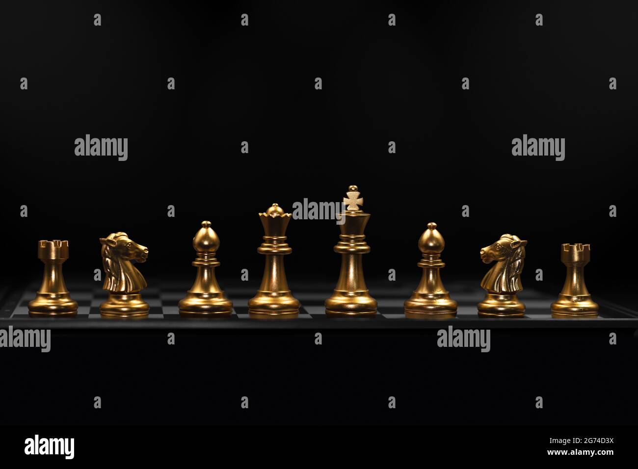 Row of Chess piece used in playing the game of chess. Business play role stand for strong teamwork ready for fight concept. Stock Photo