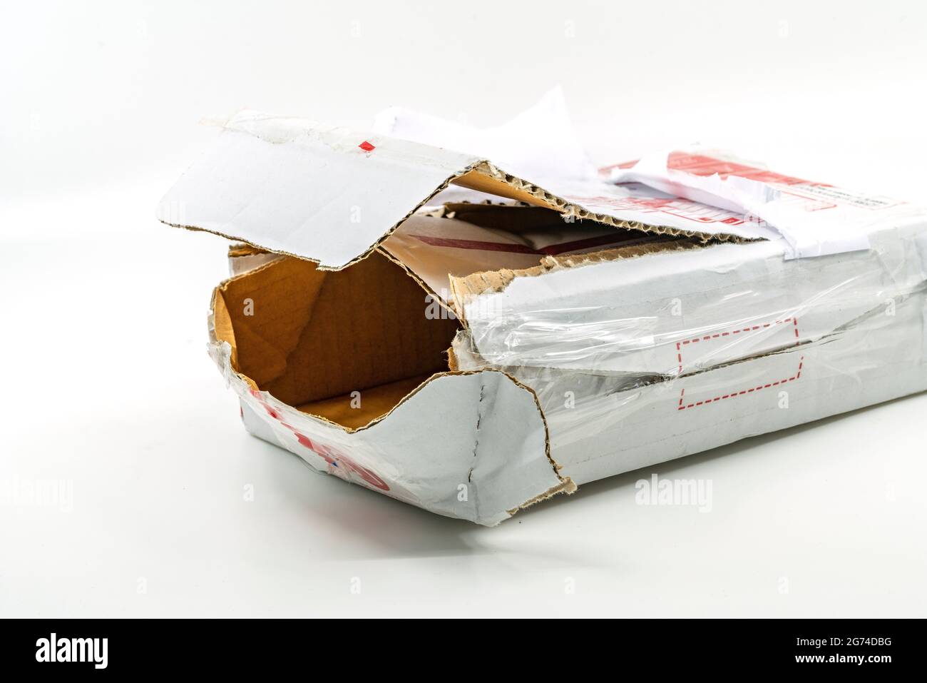 Torn white parcel box on white background. Close up large hole on the  parcel box. The stolen internal package box Stock Photo - Alamy