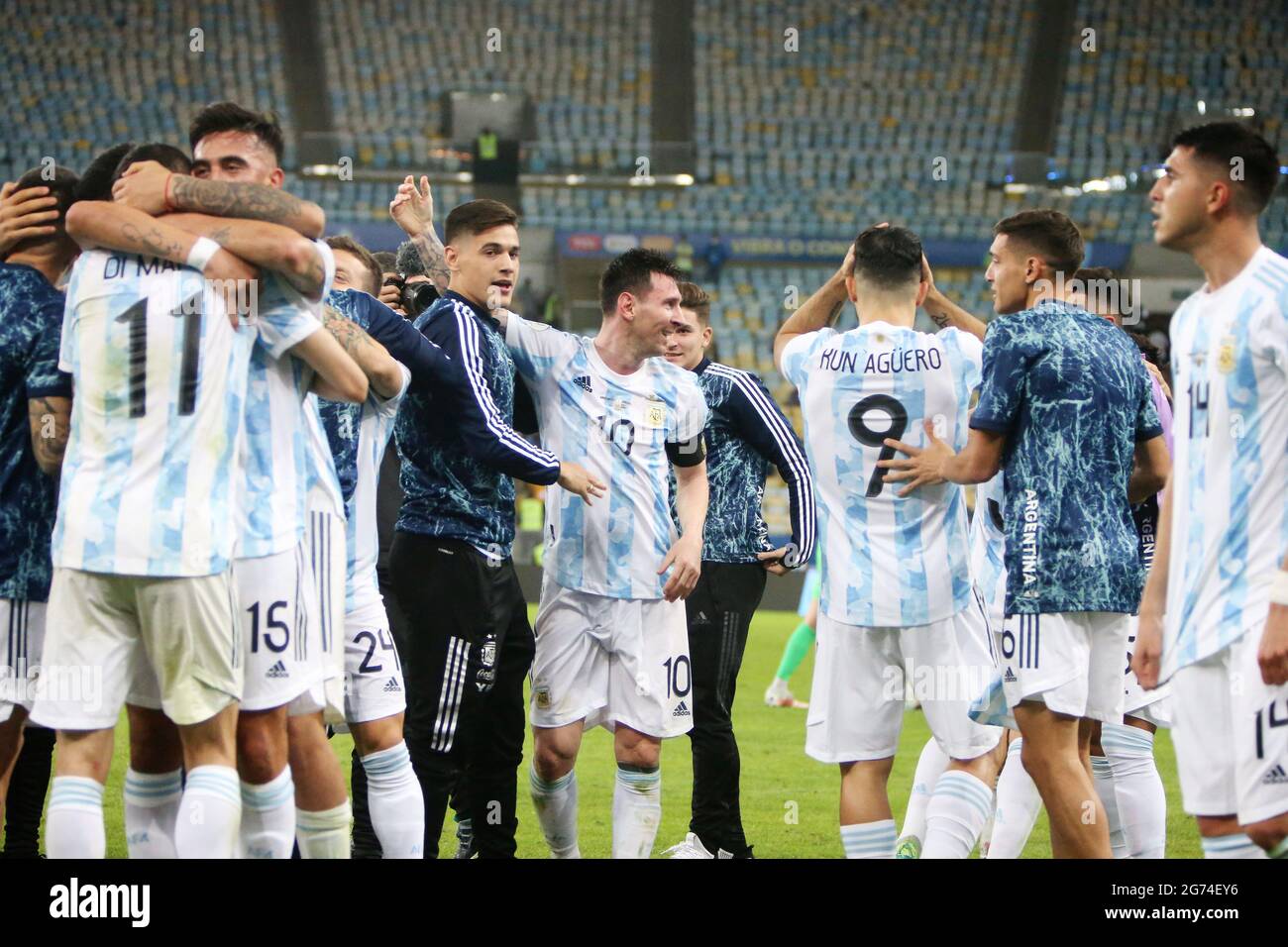 Lionel Messi of Argentina celebrates the victory with teammates after