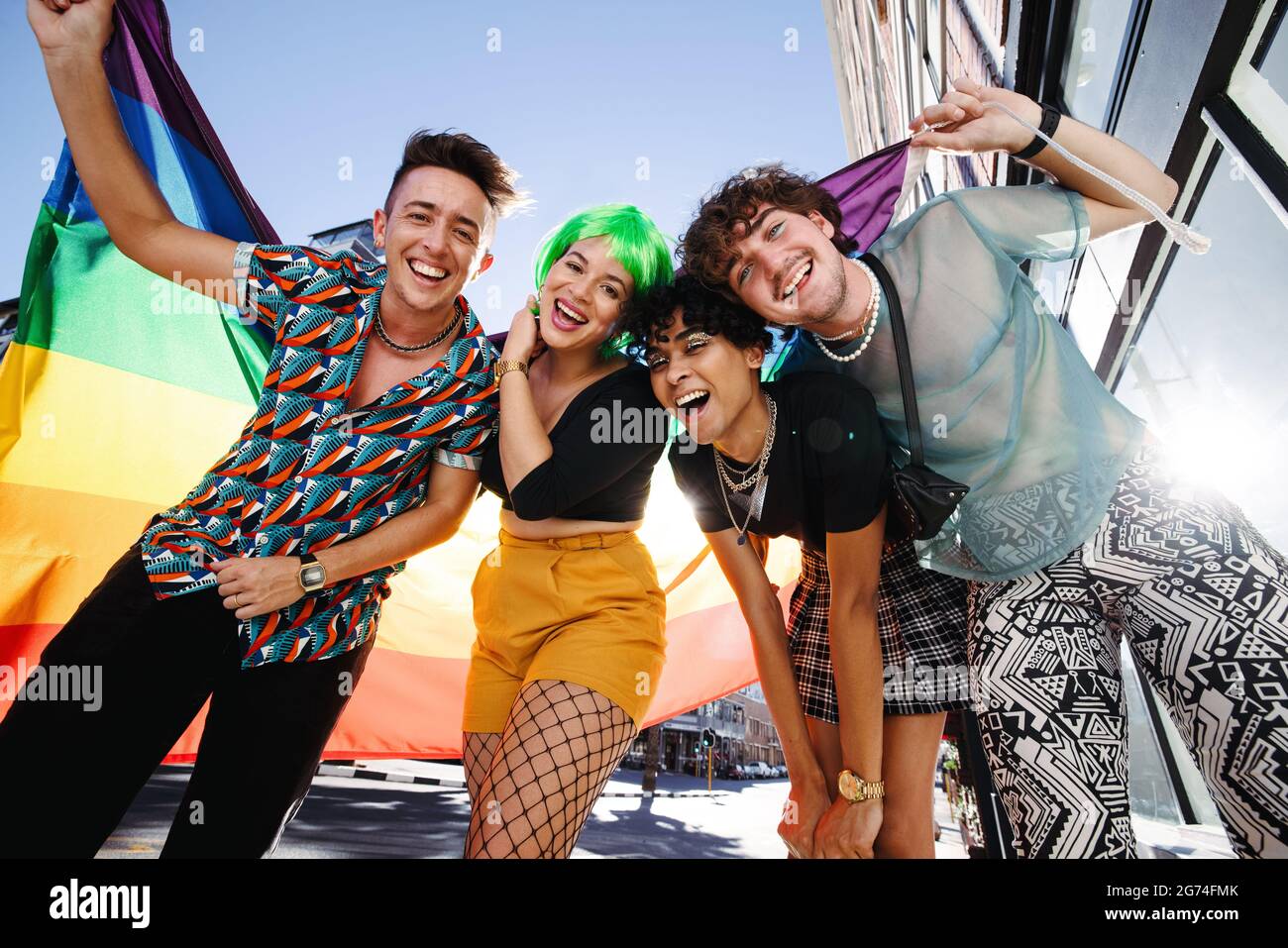 Young LGBTQ+ people celebrating pride together. Group of young queer