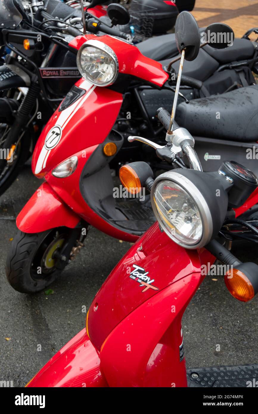Motor scooters and motor bikes parked in central city, Wellington, North Island, New Zealand Stock Photo