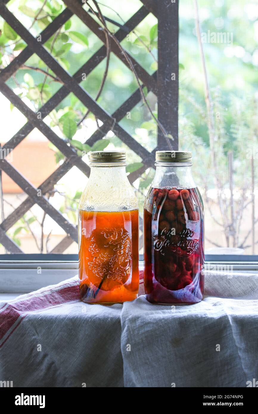 Homemade fruits liqueur Stock Photo Alamy
