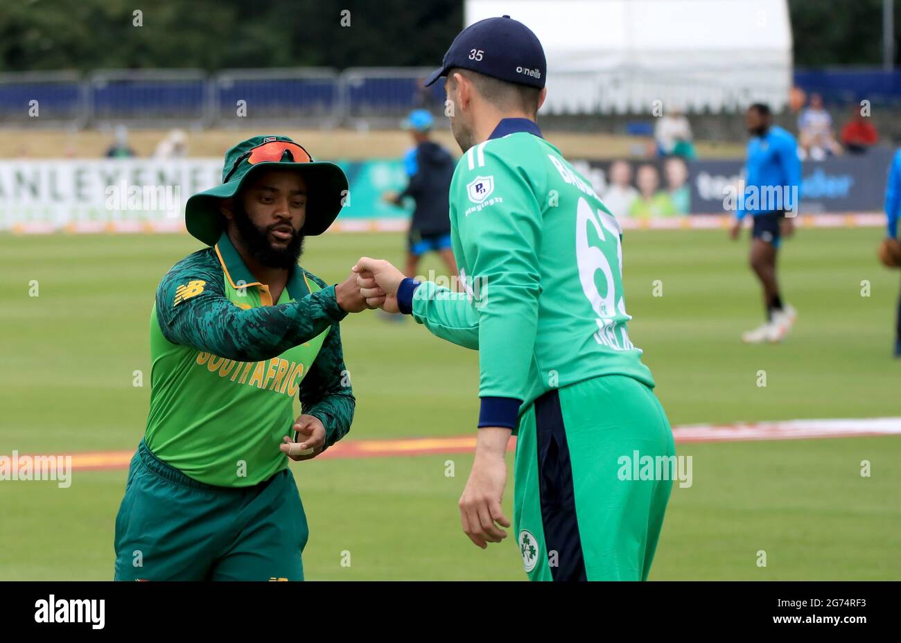 South Africa captain Temba Bavuma bumps fists with Ireland captain ...