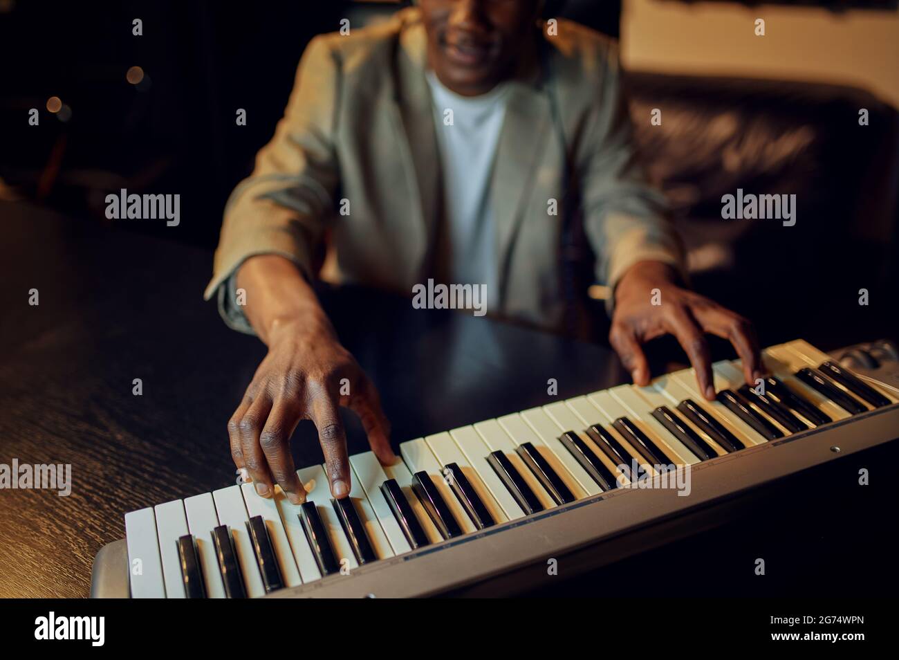 Sound engineer in headphones, recording studio Stock Photo Alamy