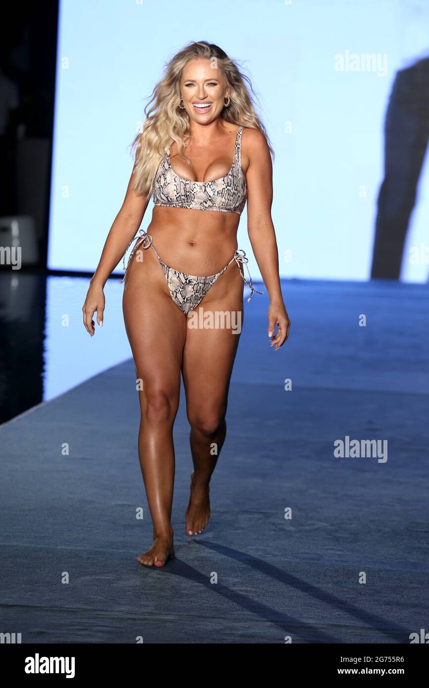 Sports Illustrated model Kristen Louelle walks in the 2021 runway show  during PARAISO Miami Swim Week at the Mondrian Hotel South Beach in Miami  Beach, Florida, on Saturday, July 10, 2021. Photo