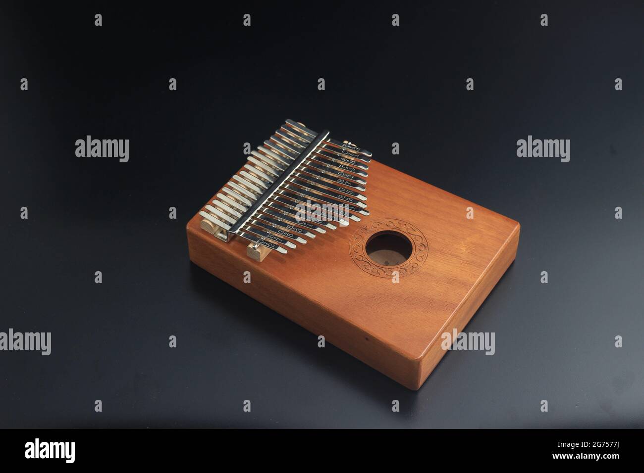 Kalimba, acoustic music instrument from africa and its soft cover at Black Background Stock Photo