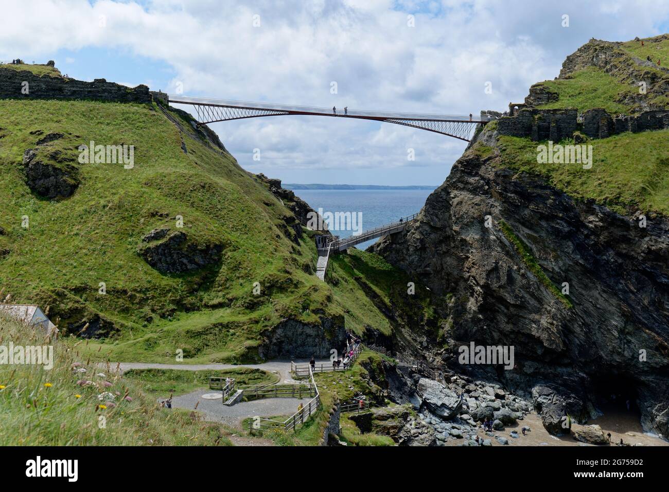 The new contemporary footbridge at Tintagal Castle in Cornwall in the South West of England not only looks beautiful it's highly functional too Stock Photo