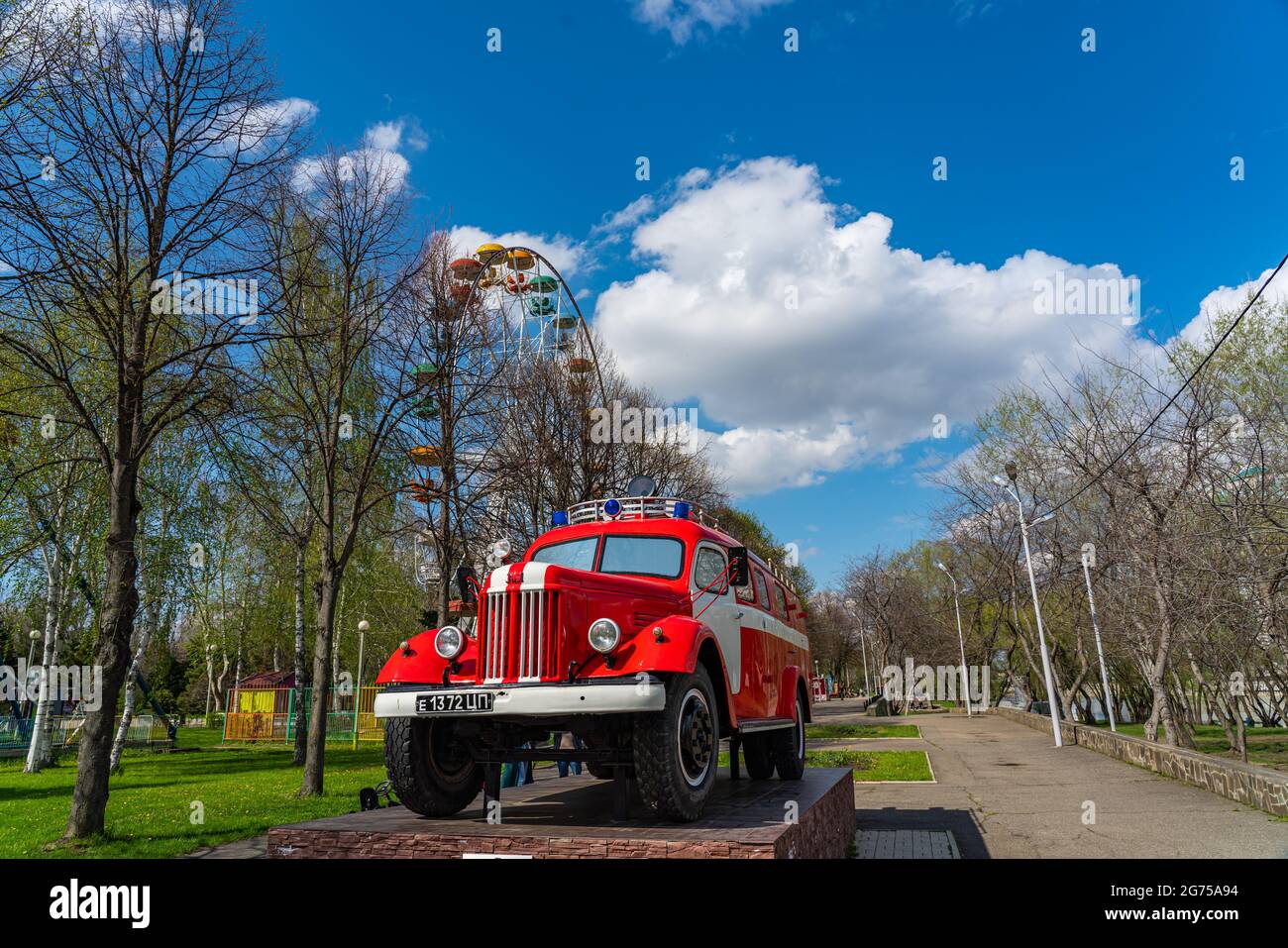 KRASNODAR - MAY 21, 2021: Fire Car Zil from Soviet time, Fire Engine Retro Soviet Car Oldtimer at Krasnodar, background blue cloudy sky Stock Photo