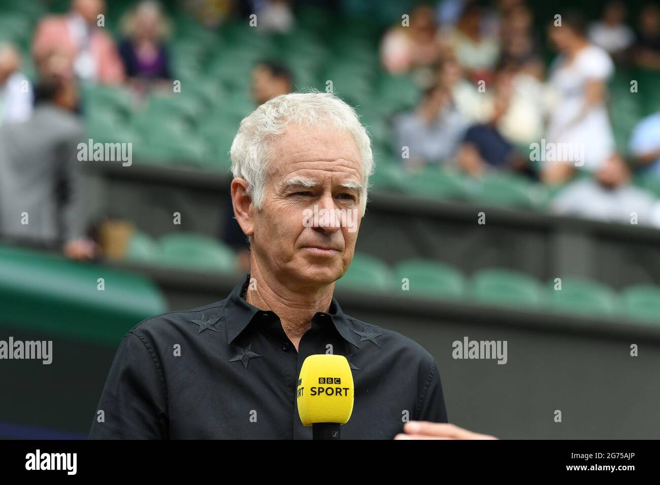 London, UK. 11th July, 2021. London Wimbledon Championships Day13 11/07/2021 John McEnroe former player now commentator Credit: Roger Parker/Alamy Live News Stock Photo