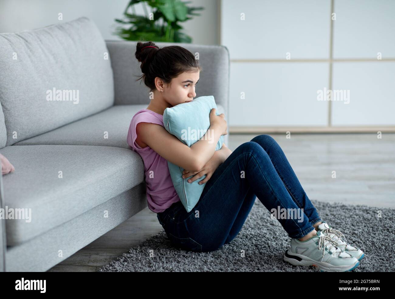 Indian girl sitting alone on hi-res stock photography and images - Alamy