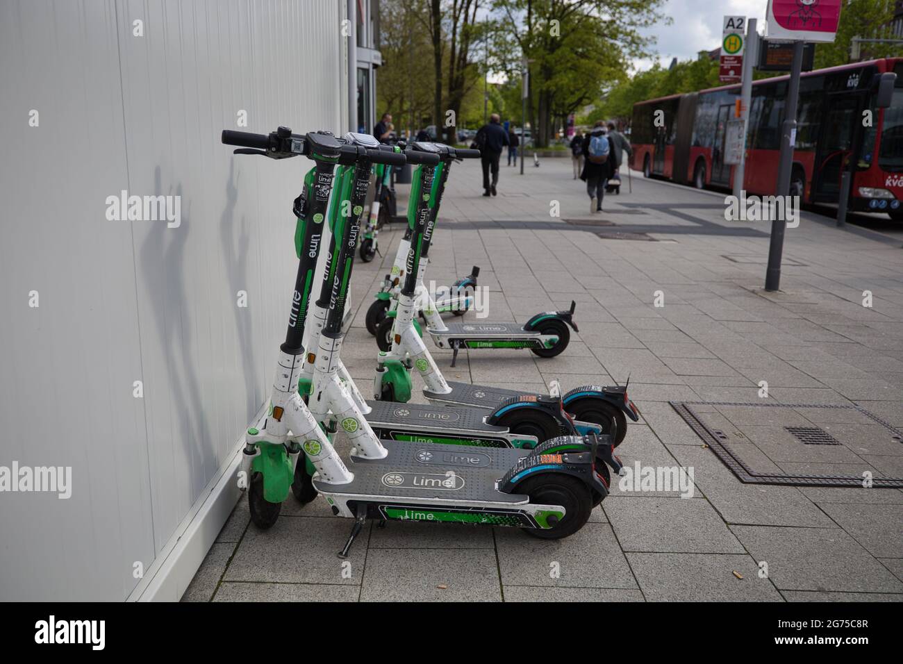 KIEL, GERMANY - May 18, 2021: Kiel, Germany, May 18 2021, new urban  mobility, electric scooters for rent, e-scooter, company lime, in  background a bus Stock Photo - Alamy