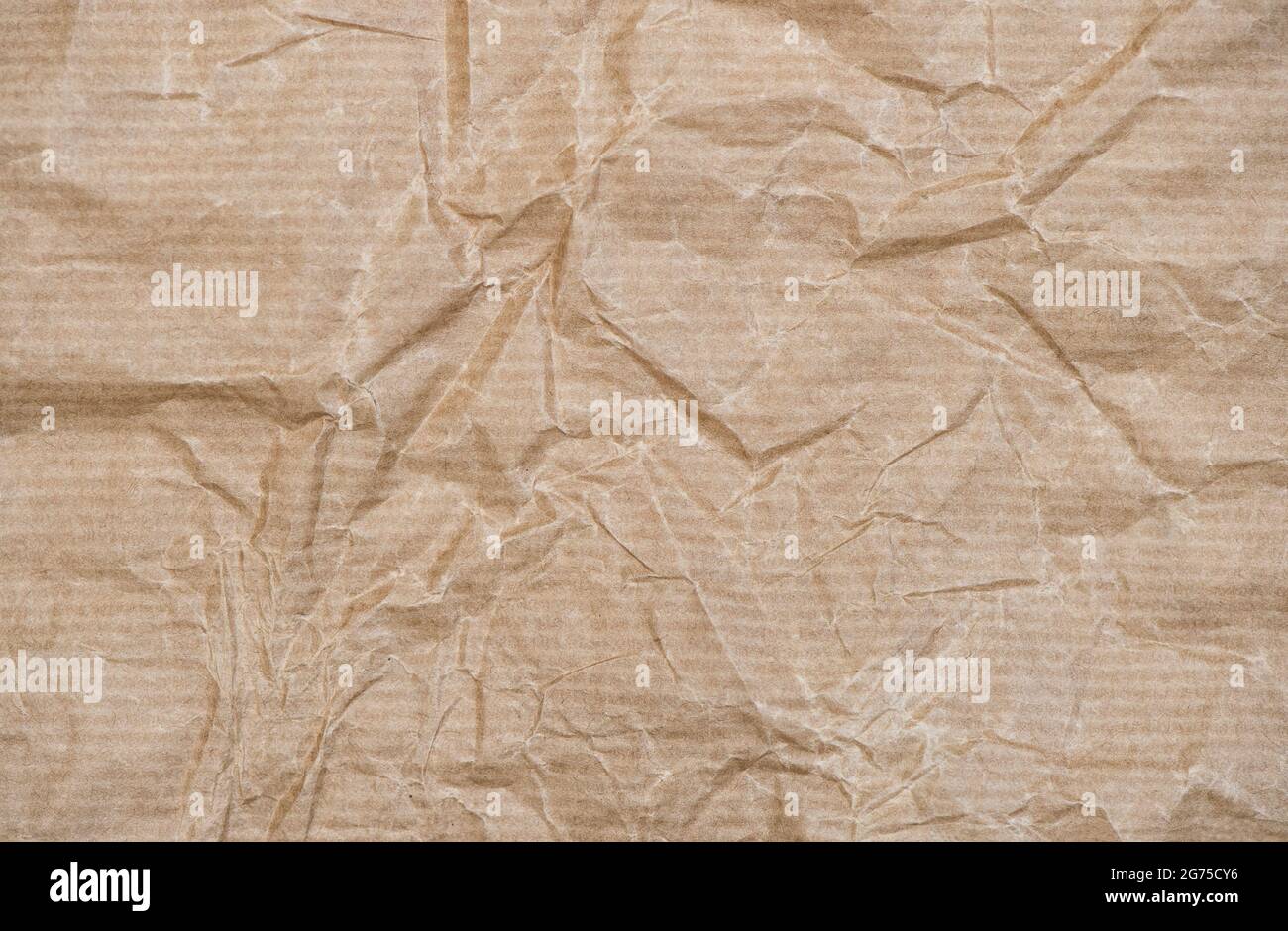Recycled crumpled paper texture. Craft paper cardboard background Stock Photo
