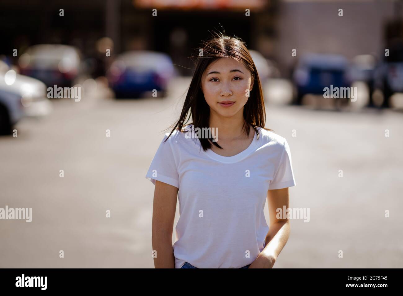 Portraits of Young Asian Woman Walking in a Downtown Parking Lot Stock ...