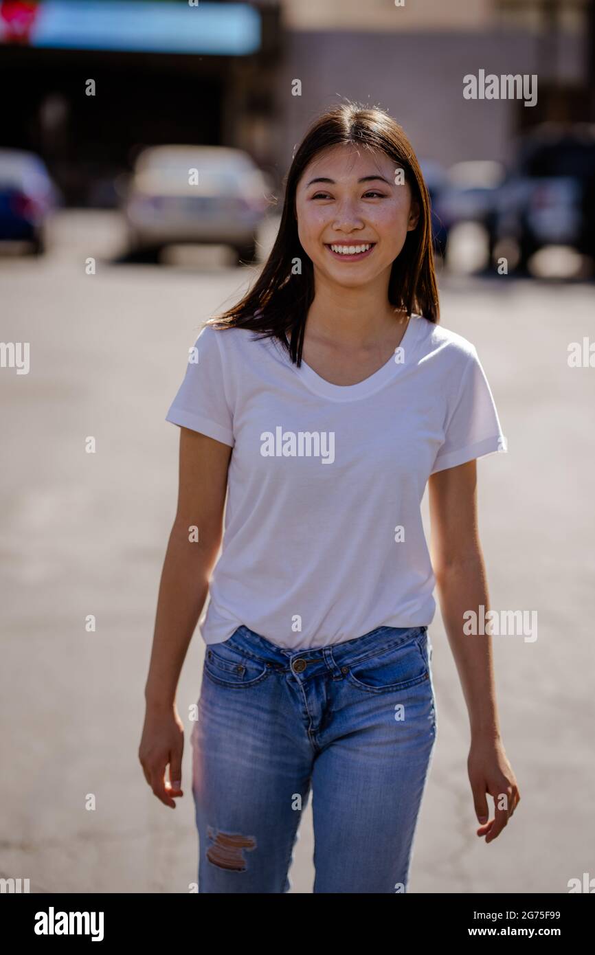 Young chinese girl in jeans hi-res stock photography and images - Alamy