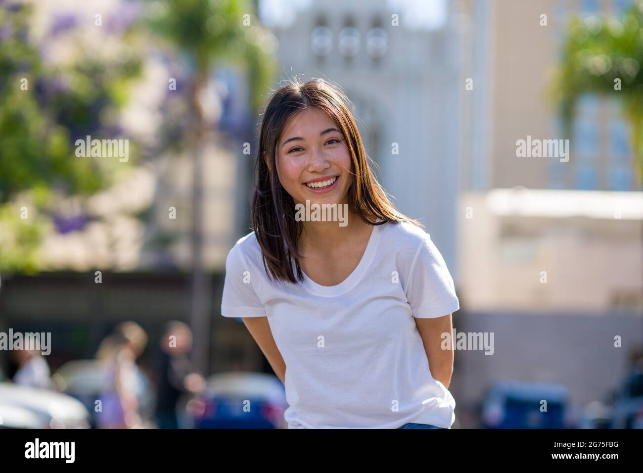 Portraits of Young Asian Woman Walking in a Downtown Parking Lot Stock  Photo - Alamy