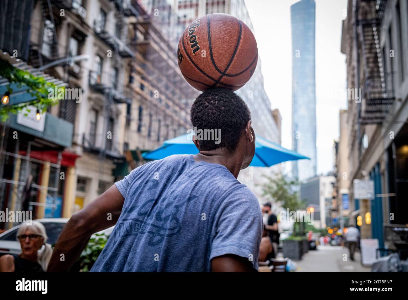 New York, New York, USA. 10th July, 2021. Baskeball player casually