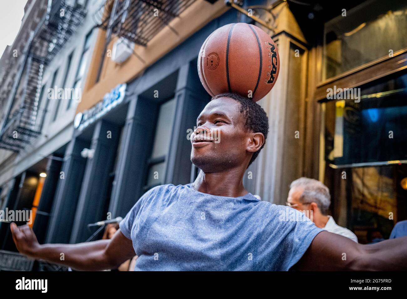 New York, New York, USA. 10th July, 2021. Baskeball player casually