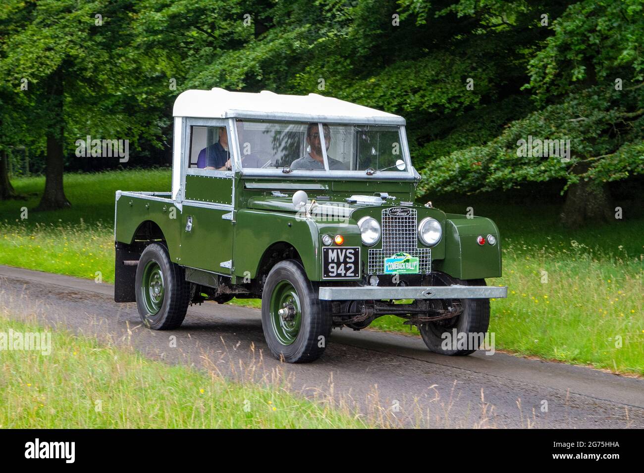 A front view of 1957 50s green Land Rover 1997cc diesel;  vintage classic car retro freedom driver vehicle automobile Stock Photo