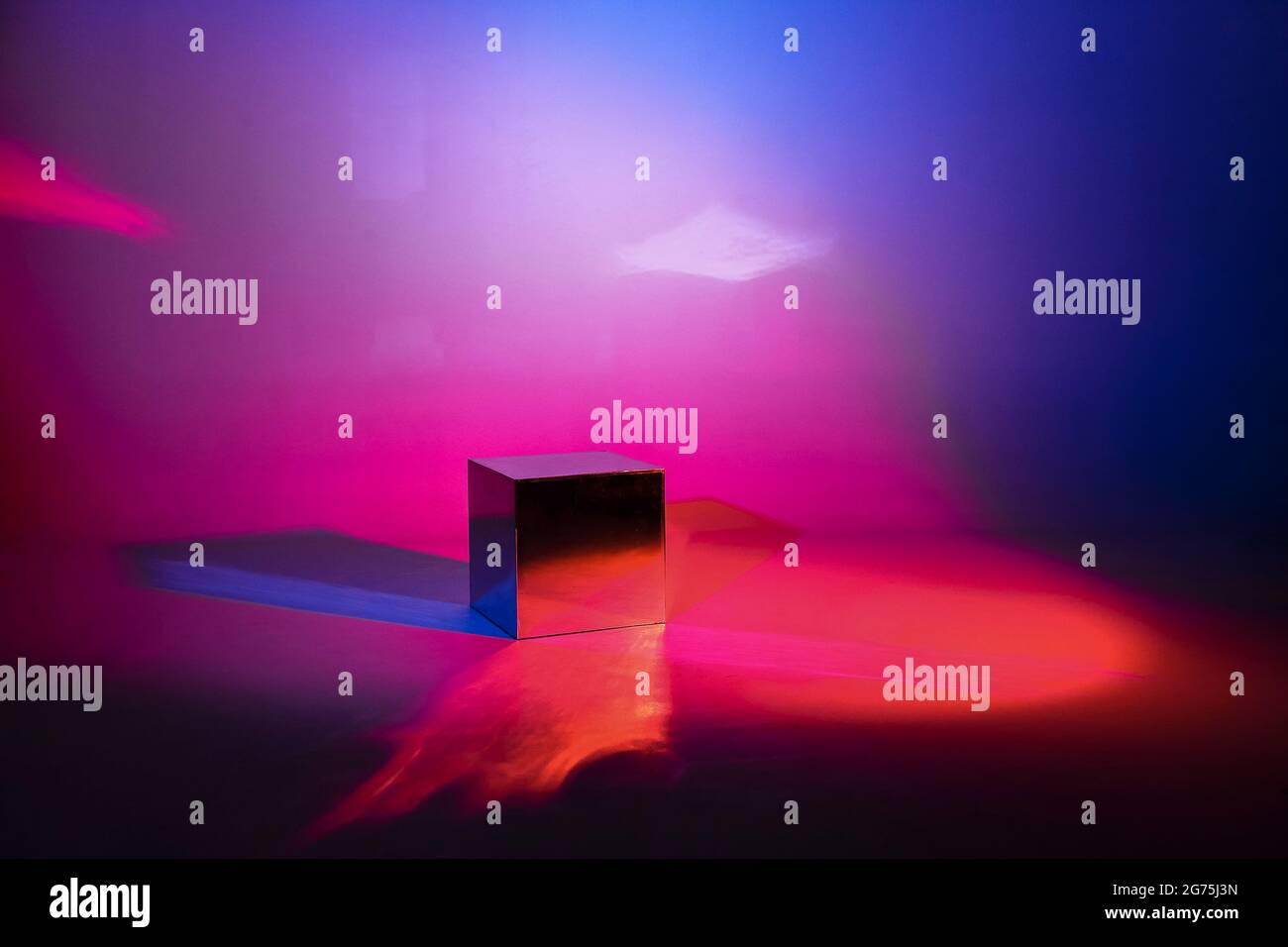 Pink and blue neon lighted background. Mirror light cube with copy space Stock Photo