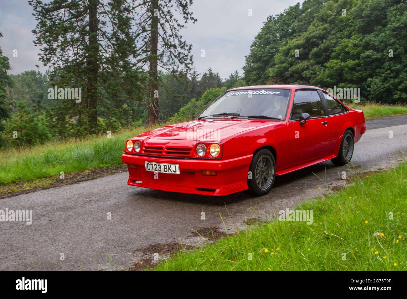 1985 80s red Opel GT 5 speed manual 1796 cc petrol 2dr coupe en-route KLMC  The Cars the Star Show in Holker Hall & Gardens, Grange-over-Sands, UK  Stock Photo - Alamy