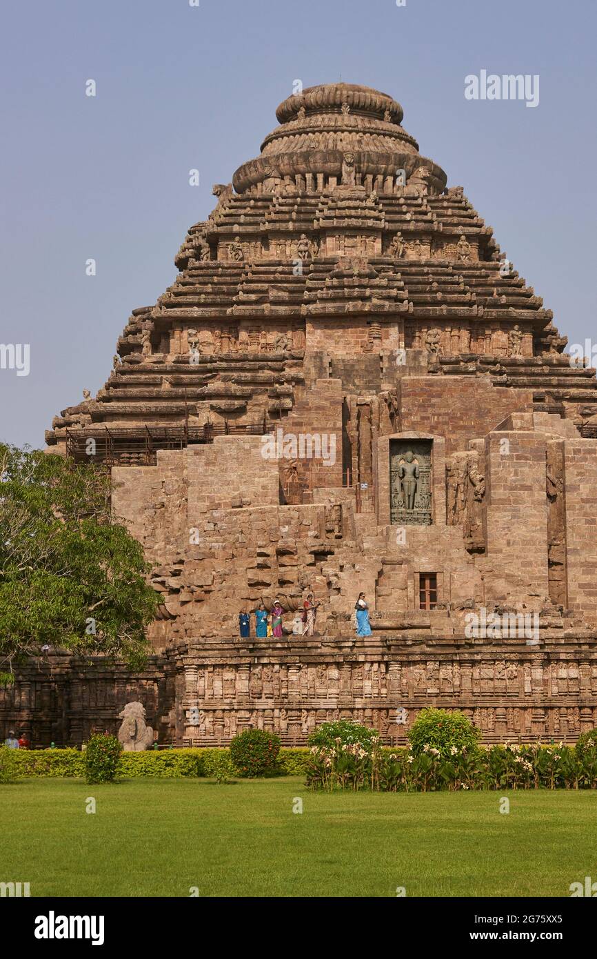 Local tourists at the ancient Surya Hindu Temple at Konark Orissa India. 13th Century AD Stock Photo